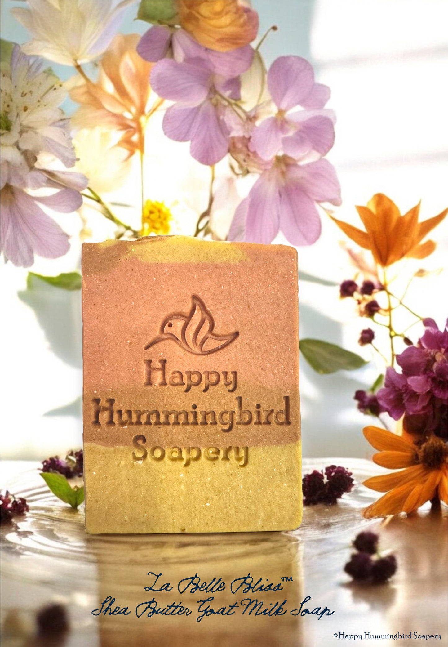 La Belle Bliss handmade shea butter and tallow goat milk soap with a floral amber scent by Happy Hummingbird Soapery.