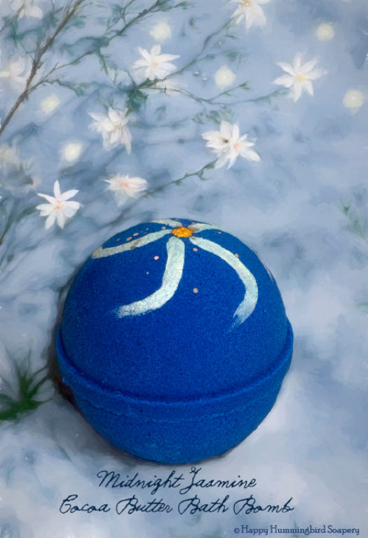 Hand-painted Midnight Jasmine Royale bath bomb with deep blue color and white floral detailing on a botanical jasmine background.