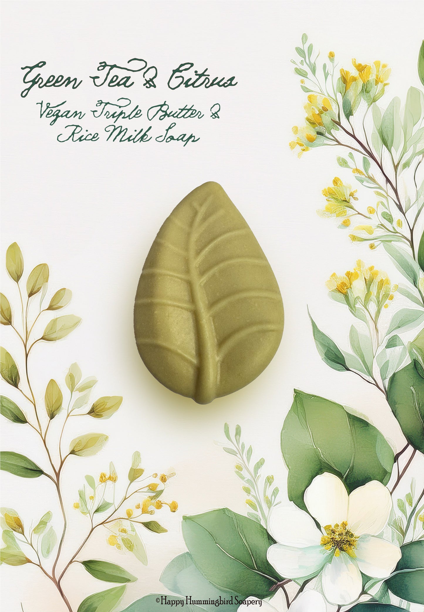 Green Tea & Citrus leaf-shaped Vegan Triple Butter Rice Milk soap on a yellow-green botanical illustration with white floral accents-Happy Hummingbird Soapery.