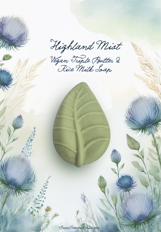 Highland Mist leaf-shaped vegan triple butter rice milk soap on a botanical illustration background – Happy Hummingbird Soapery.