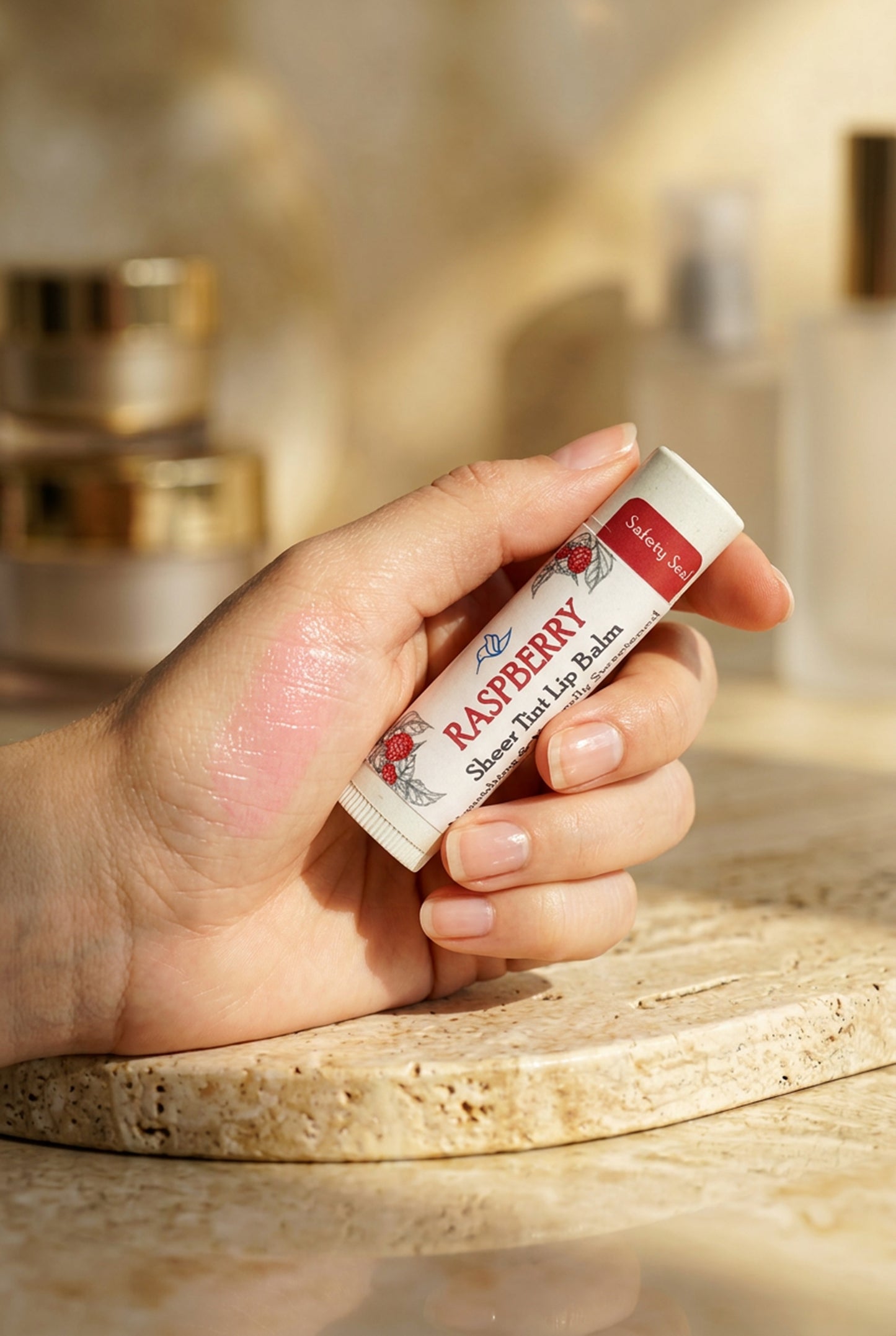 Raspberry Sheer Tint Lip Balm by Happy Hummingbird Soapery – hydrating treatment with a subtle, natural pink finish.