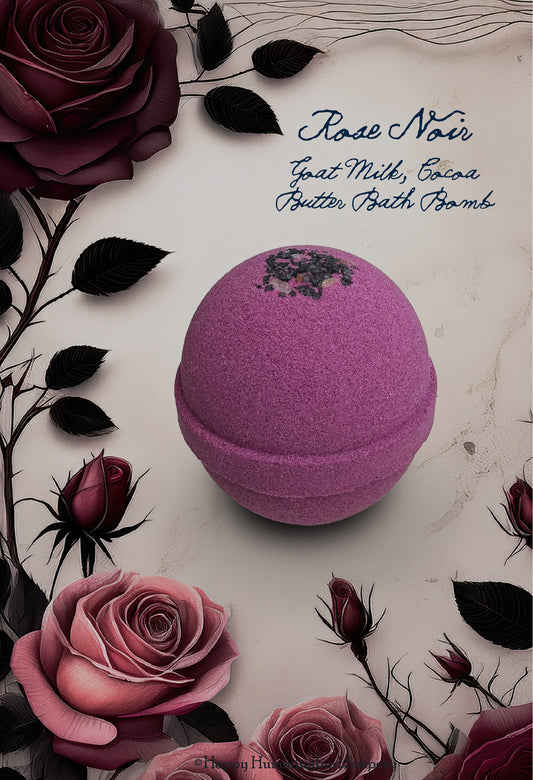 Happy Hummingbird Soapery Rose Noir bath bomb, a round deep pink bath bomb centered on a cream background decorated with dark red roses and green leaves.