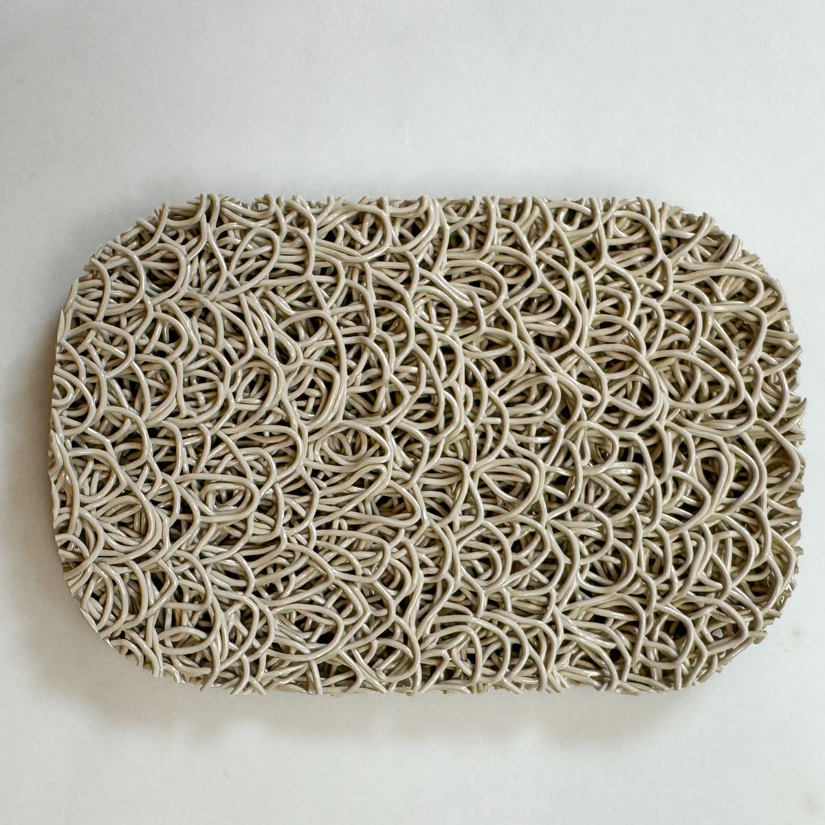 Authentic Original Soap Lift® oval soap rest in Bone.