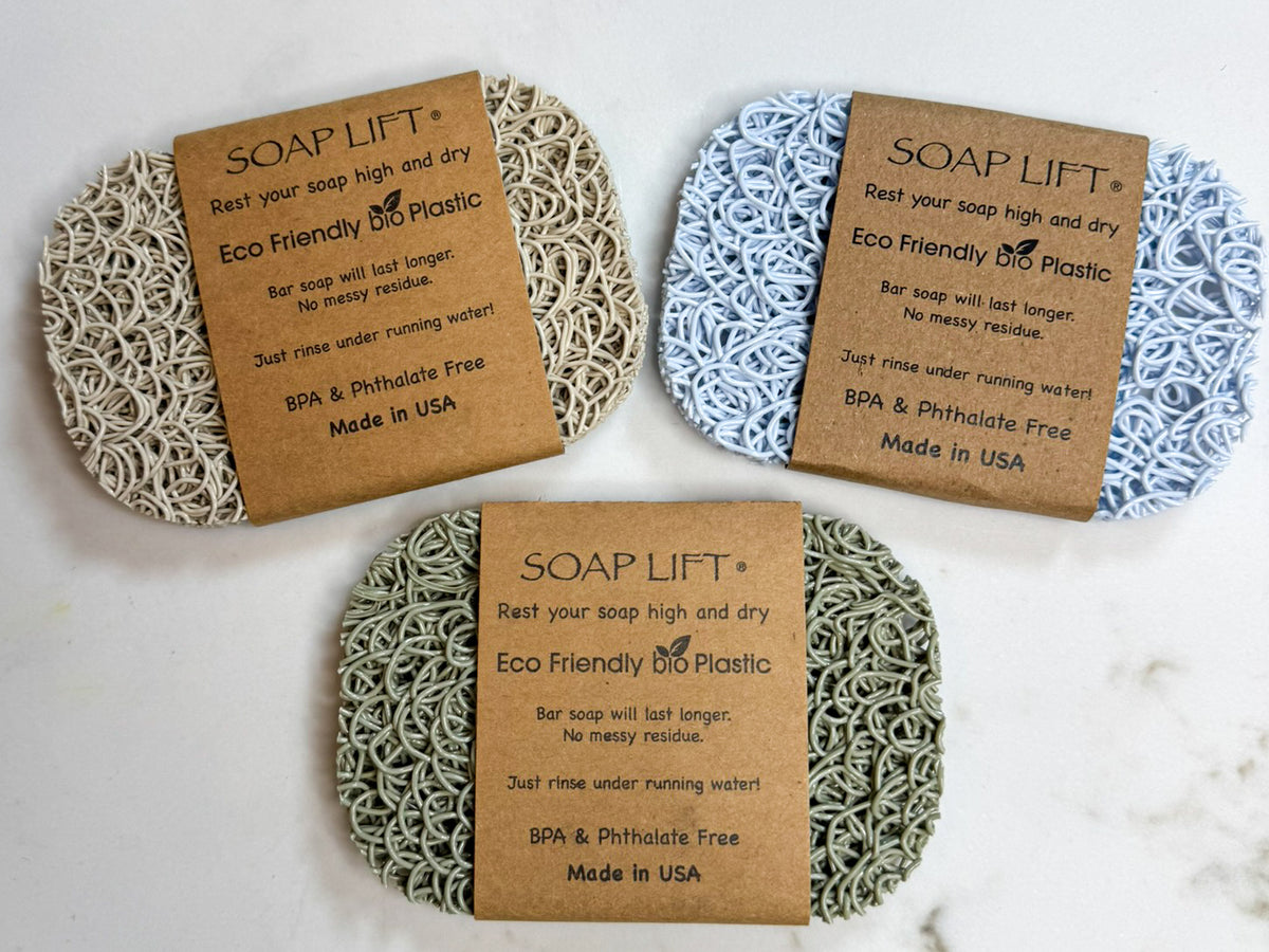 Authentic, Original Soap Lift® oval soap rests in Bone, Sage, and Seaside colors.