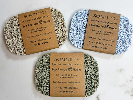 Authentic, Original Soap Lift® oval soap rests in Bone, Sage, and Seaside colors.